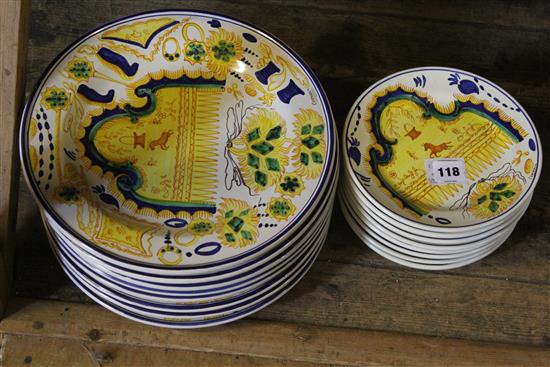 16 Spanish faience dishes, in two sizes